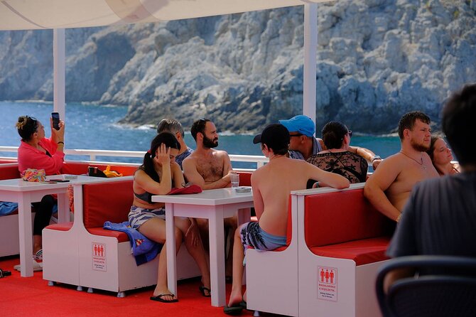 Alanya Boat Trip w/Unlimited Drinks & Lunch (Free Hotel Transfer) - Ulas Beach and Lunch on the Water: The Meal That Keeps the Day Moving