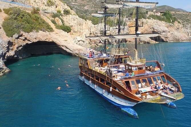 Alanya Catamaran Boat Tour with Lunch, Soft Drinks & Transfer - Stop 2: Sailing the Alanya Coast and Listening to the Crew