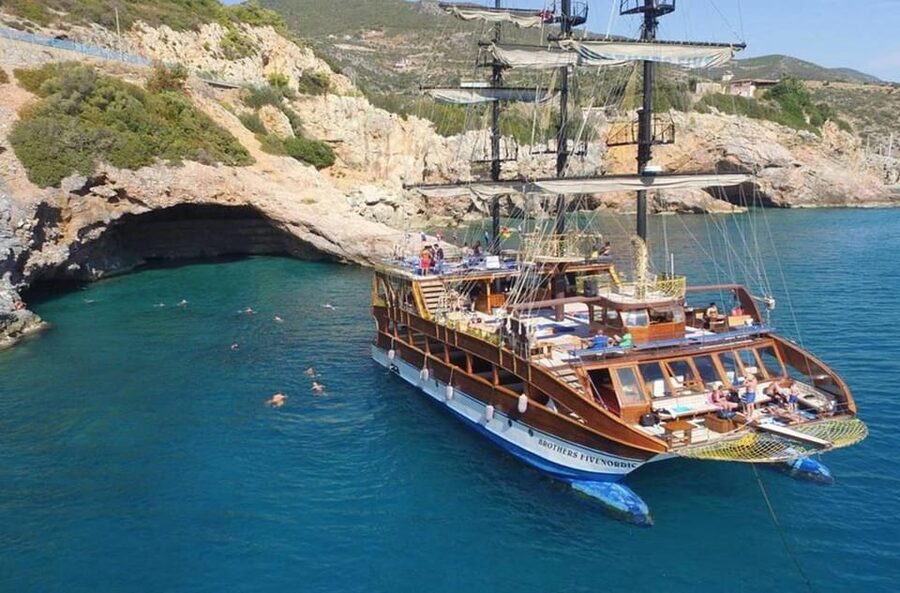 Alanya: Catamaran Boat Tour with Snorkeling with Lunch - Cleopatra Beach from the water: time to cool off properly