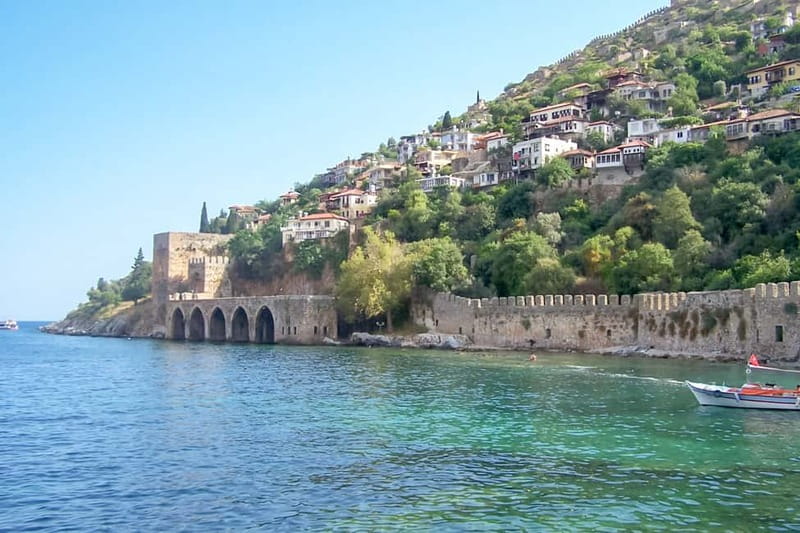 Alanya: Pirate Boat with Transfer, Lunch & Unlimited Drinks - Cruising past Red Tower, Alanya Castle, and the Old Shipyard