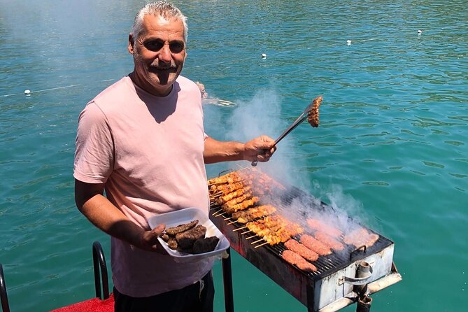Alanya Relaxing Boat Tour with Lunch, Soft Drinks & Transfer - On the Water: Coastline Views, Calm Music, and Swim Stops