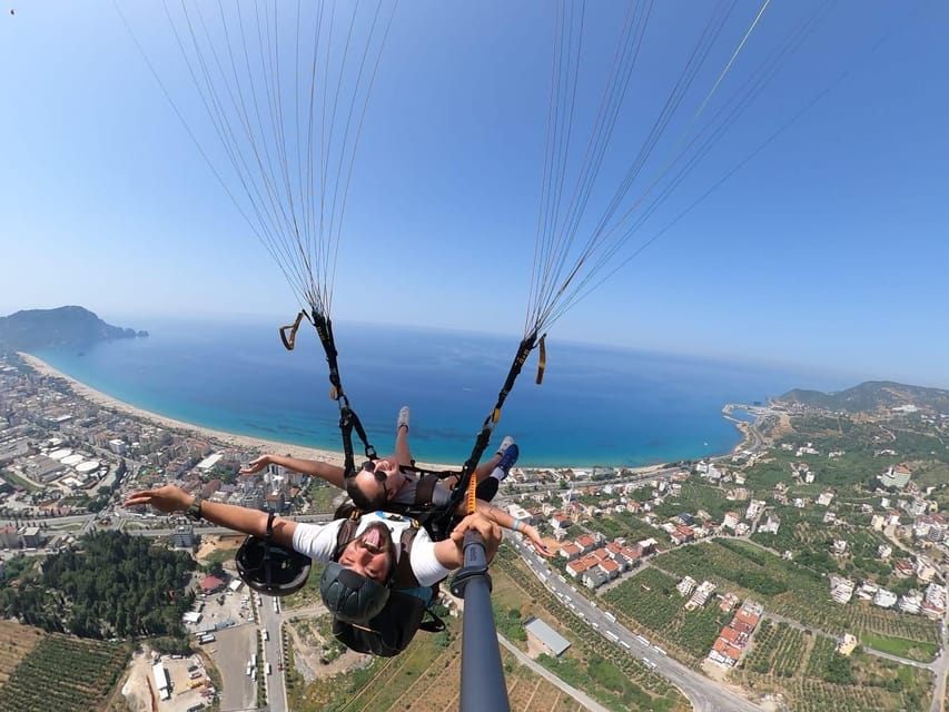 Alanya: Tandem Paragliding Flight to Cleopatra Beach - Safety and language comfort, what “licensed” means in practice