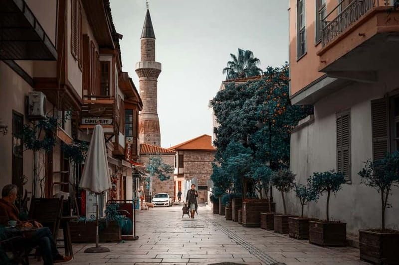 Antalya: Old Town Walking Tour with Turkish Tea and Baklava - Clock Tower and Antalya Castle Entrance: A 1901 Landmark With Context
