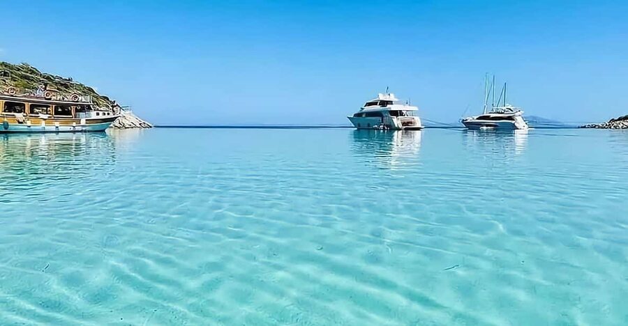 Bodrum: Orak Island Boat Trip with Lunch & Optional Transfer - German Bay Swimming Stops: Sun Deck Views and Real Water Time