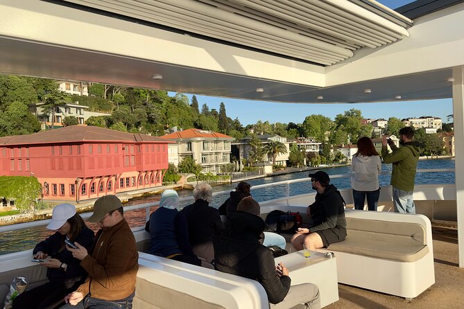 Bosphorus Daytime or Sunset Sightseeing Cruise & Audio Guide - First landmark run: Dolmabahçe Mosque and the Dolmabahçe Palace reveal