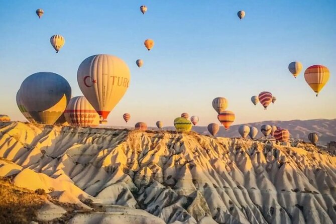 Cappadocia Hot Air Balloon with Pickup, Breakfast & Champagne - Fairy Chimneys views from the basket, plus the “love story” framing