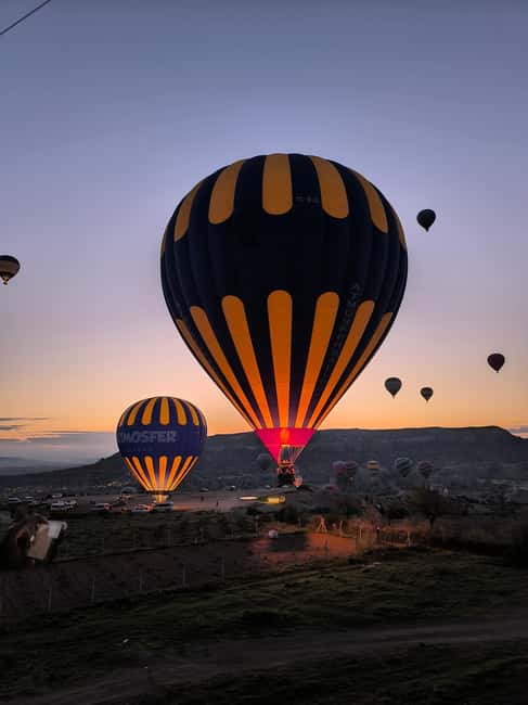 Cappadocia: Sunrise in Göreme Hot Air Balloon and Transfer - Weather Cancellations: How To Stay Calm (And Still Go)