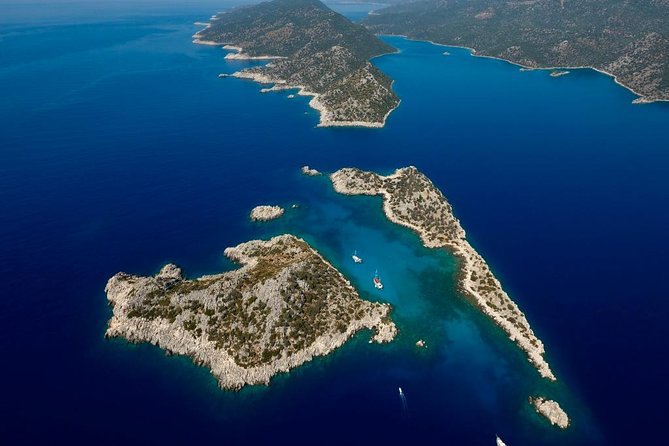 Deluxe Sunken City Boat Guided Tour From Kas - The early stretch: passing the pebble beach and getting your bearings
