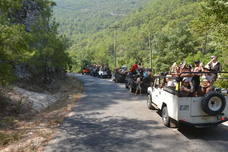 From Alanya: Jeep Safari with Lunch, Dim River & Cave - Traditional village stop: fruit, market browsing, and quick culture time