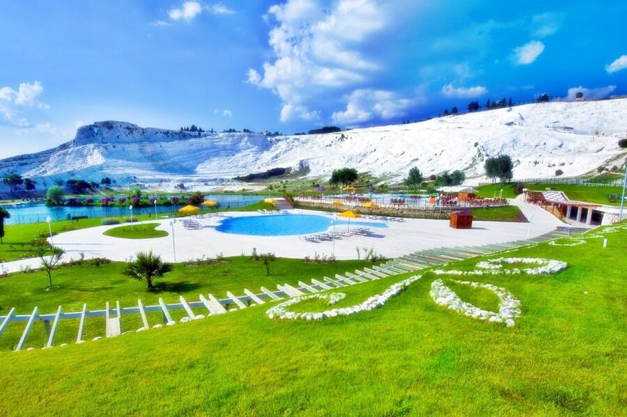 From Kusadasi and Selcuk: Pamukkale and Hiearapolis Tour - Hierapolis essentials: Necropolis, gates, Roman Bath, and the warm-water transition