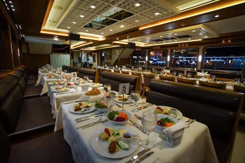 Istanbul: Bosphorus Dinner Cruise & Turkish Night Show - Your onboard setup: indoor comfort, outdoor photos