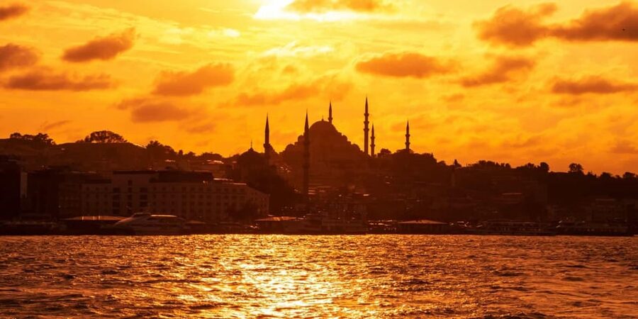 Istanbul: Morning or Sunset Cruise with Guide and Snacks - Ciragan Palace and the Bosphorus Bridge: Getting the Big-Photo Perspective