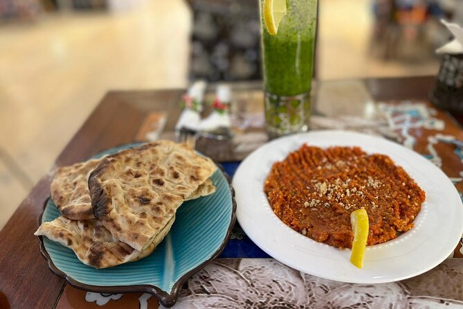 Istanbul Spice Market & Historic Centre Food Tour w/ 10 Tastings - Fermeneciler Caddesi: grilled fish from the market, cooked live