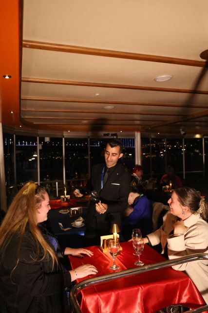 Istanbul: Turkish Night on the Bosphorus Dinner Cruise - Sailing and sightseeing: Istanbul’s lit landmarks, across two continents