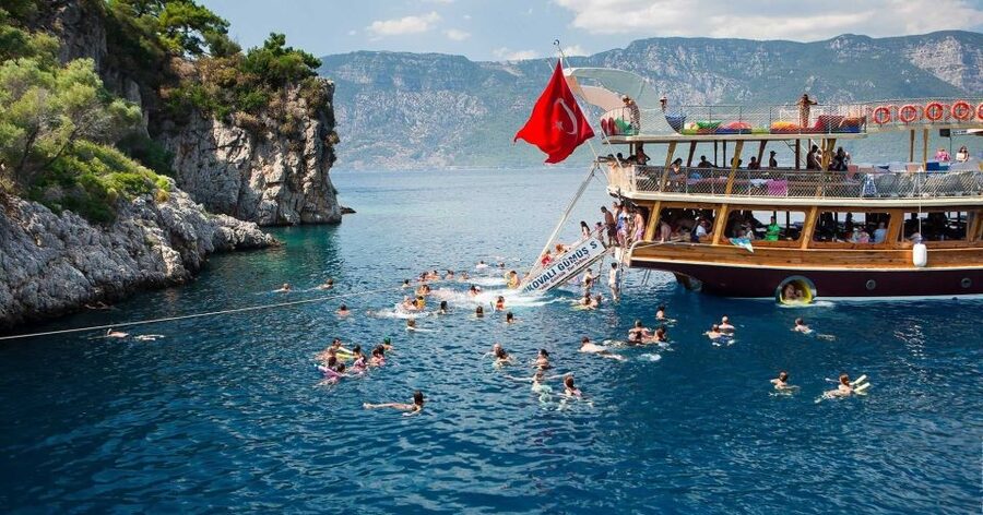 Marmaris: Cleopatra Island Boat Trip with Lunch and Transfer - Deep Blue Bay: why the darker water feels extra fun