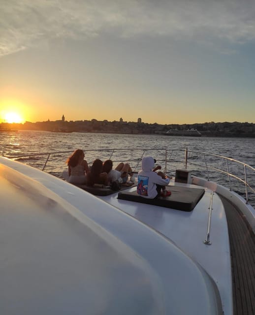 Private Bosphorus Yacht with Local Guide and Snacks - Maiden’s Tower after dark edges in