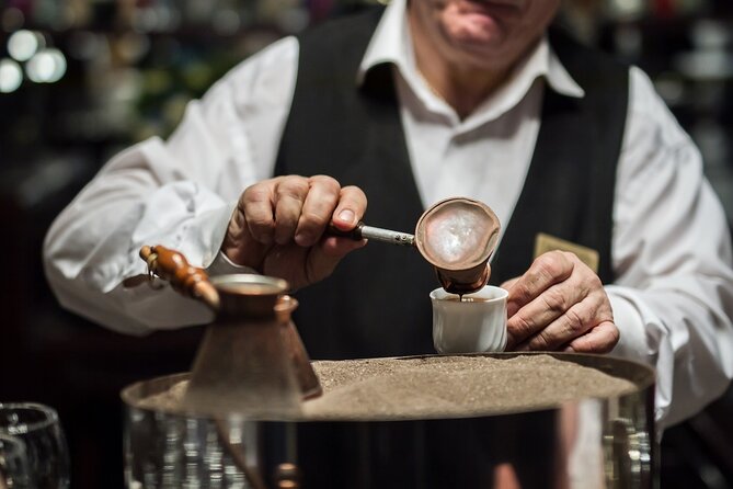 Sand-Brewed Turkish Coffee Workshop in Cappadocia - Grinding the Coffee, Then Brewing in a Cezve Over Sand